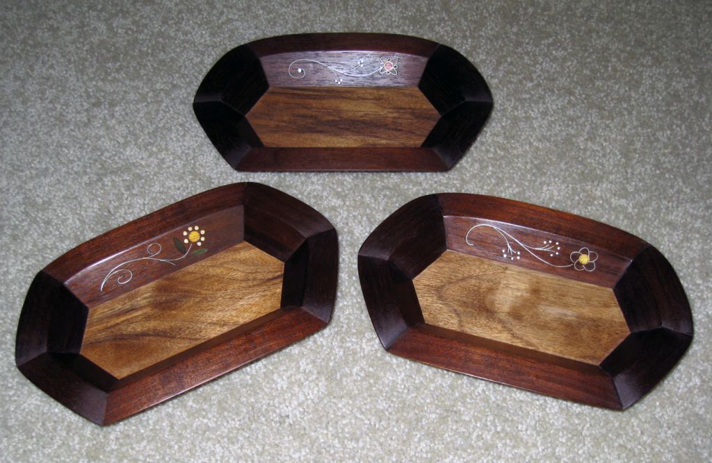 material: Peruvian walnut, silver-wire for inlay, colored stone